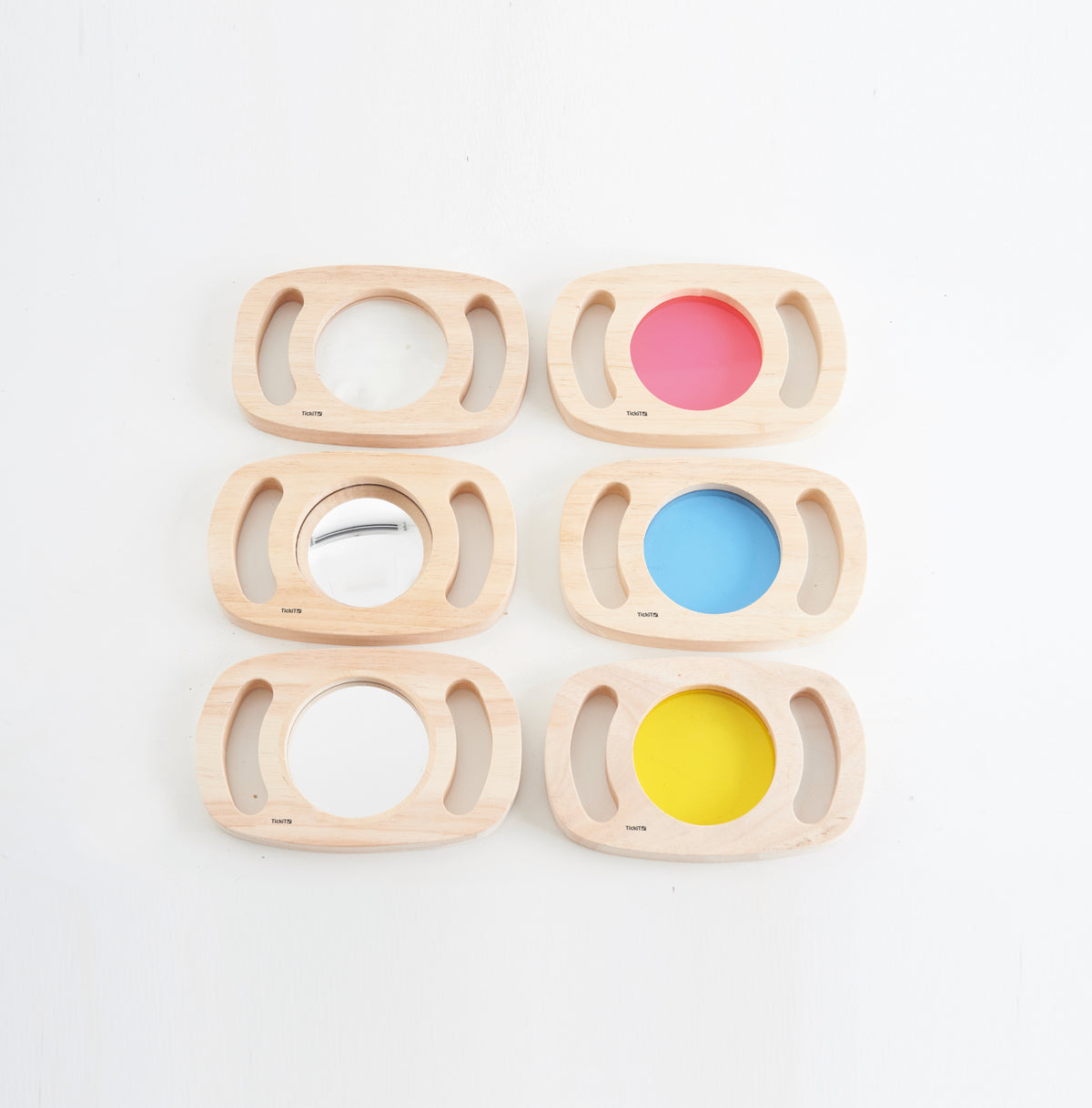 Set of six wooden sensory face frames with colored circular windows and empty inserts