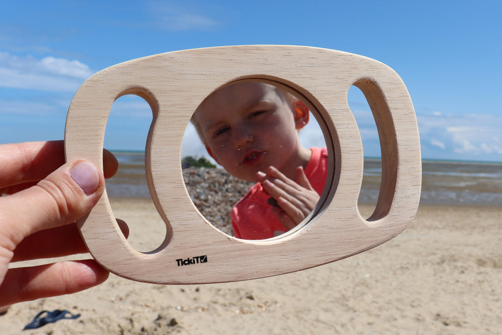 Wooden sensory face visor with an amber tinted viewing window