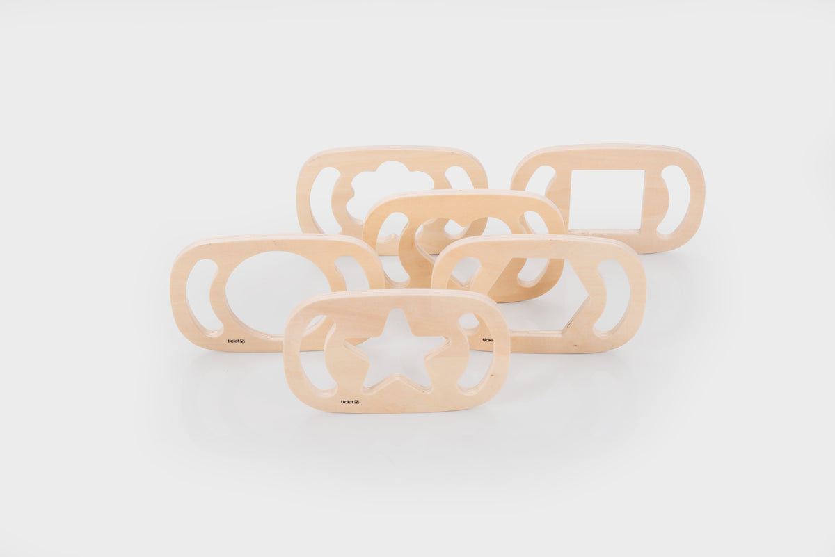Wooden shape sorter set with curved trays and multicolor insert blocks