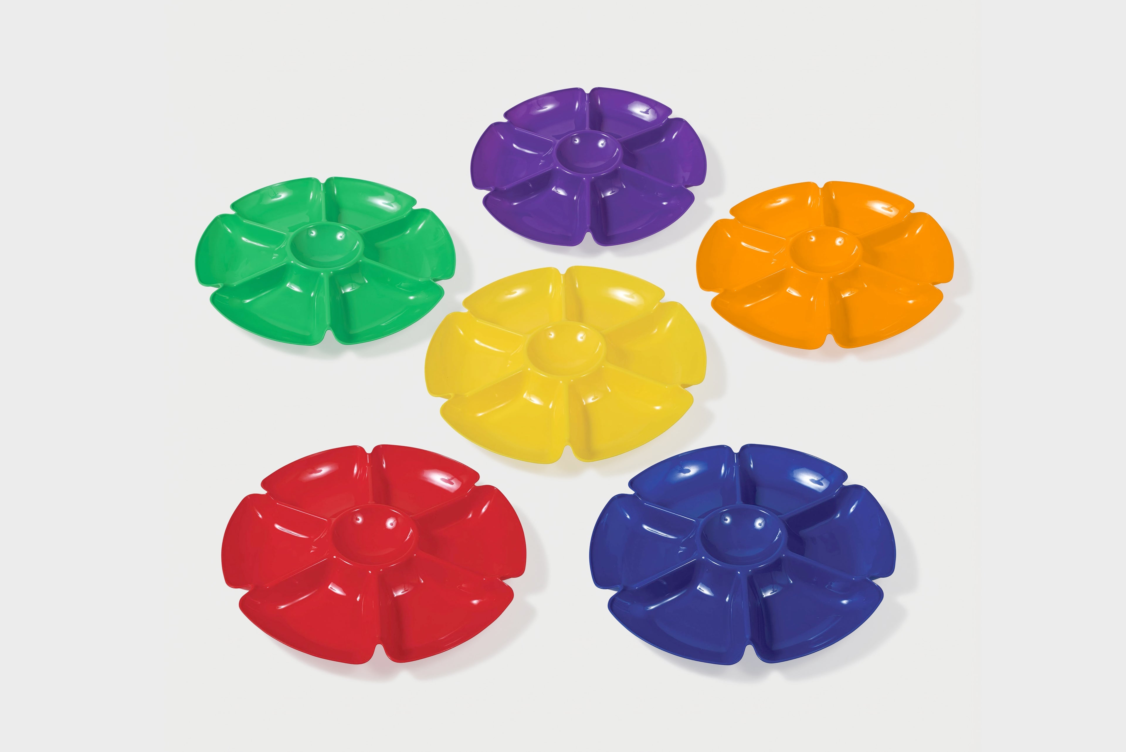 Six flower-shaped paint trays in red, orange, yellow, green, blue, and purple