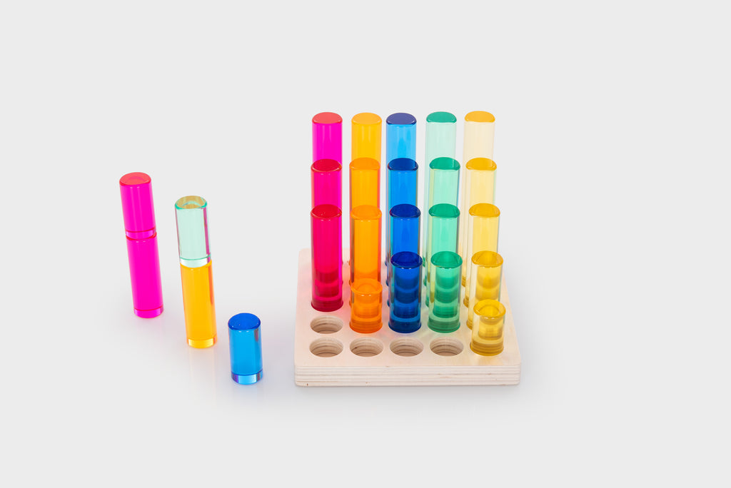 Gem column set with multicolor tubes on a tray plus detached columns in pink and blue