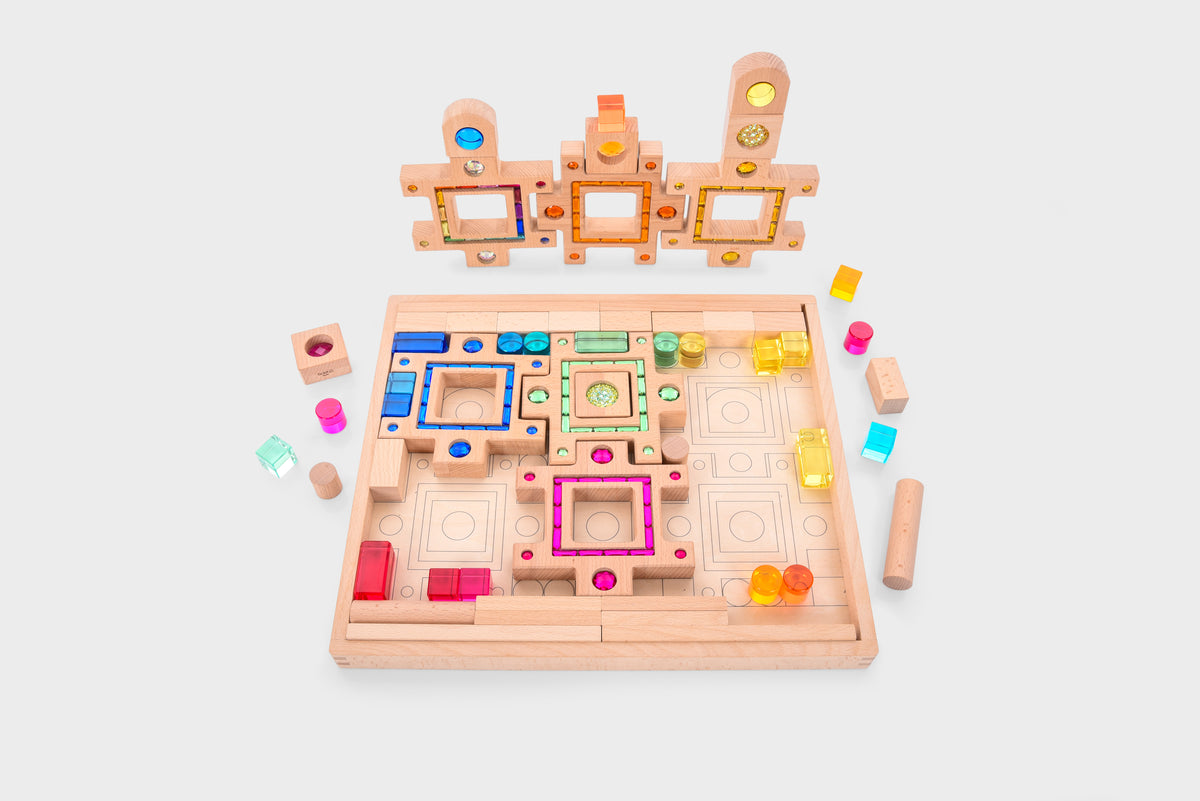 Wooden gem puzzle board with colorful square and circle block inserts