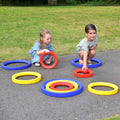 Giant activity ring set with large blue, red, and yellow rings for outdoor play