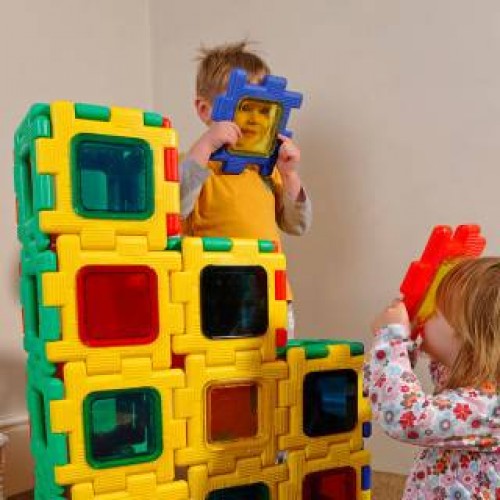 Colorful interlocking window blocks with square colored panels and cutout openings