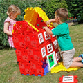 Giant polydron house builder set with red panels, yellow roof, windows and doors