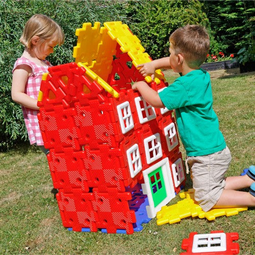 Giant polydron house builder set with red panels, yellow roof, windows and doors
