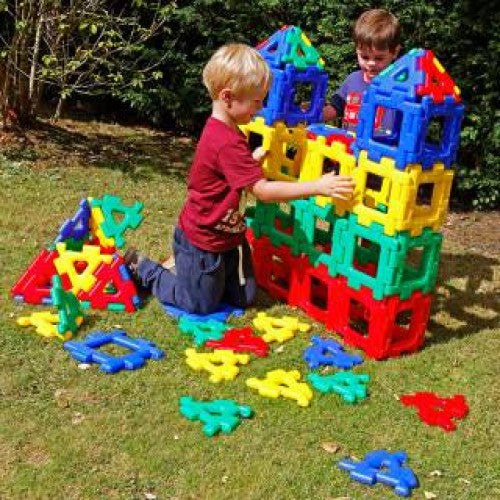 Giant polydron building set with large colorful interlocking geometric pieces