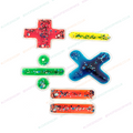 Glitter squishy maths symbols set (5): red plus, yellow bar, green circle & bar, blue cross.