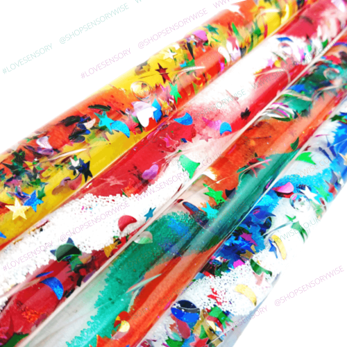 Glitter tube jumbo close-up with multicolor star confetti and shiny glitter details