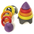Clown hat balance toy with stacked rings; purple top, yellow orange red layers