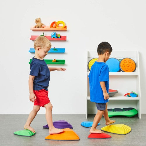 Six-piece set of colorful foam stepping stones with rounded, ridged surfaces