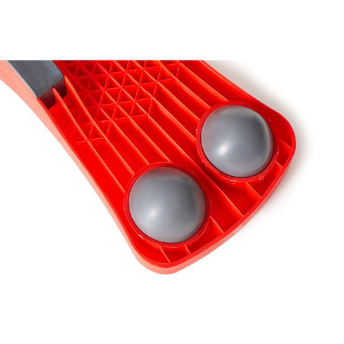 Red underside of seesaw with textured grid and two gray circular pads