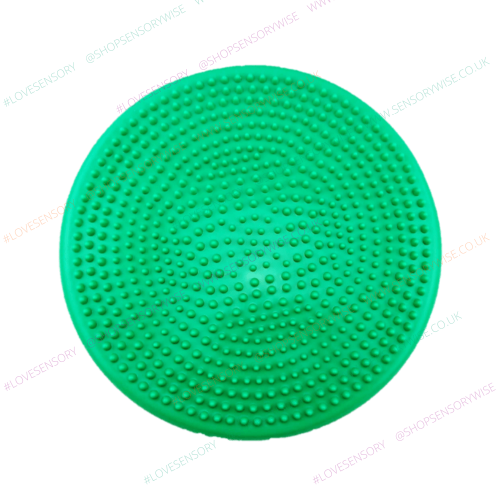 Gymnic balance wobble cushion with green studded surface