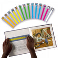 Colorful cartoon page bookmarks set, shown sticking out of an open book