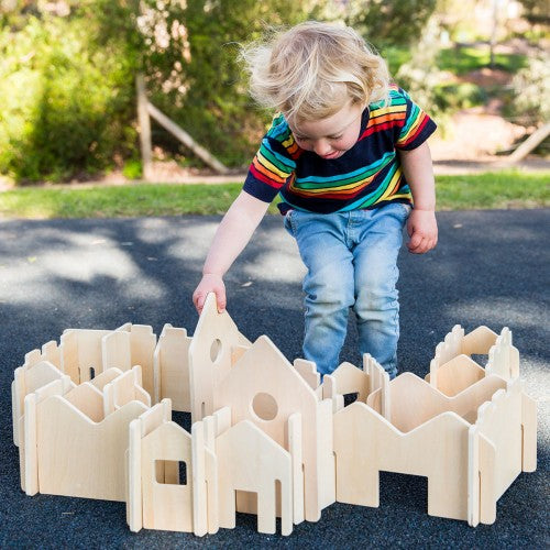 Wooden building set pieces with fence panels for stacking and creating shapes