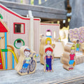 Colorful kindergarten character play set with boy, girl, and wheelchair doll figures