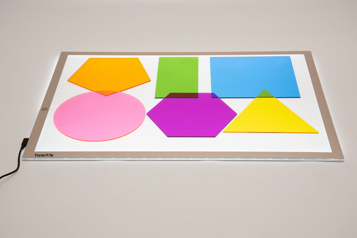 Jumbo color mixing shapes tray with assorted large circles, polygons, and rectangles