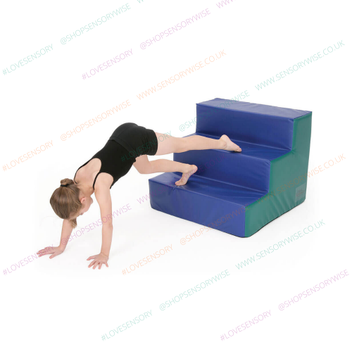 Blue foam move-and-play steps with green edges and three stacked blocks
