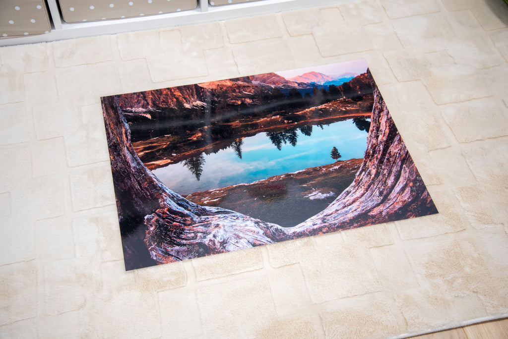 Kids’ play mat with lake view and rocky shoreline artwork