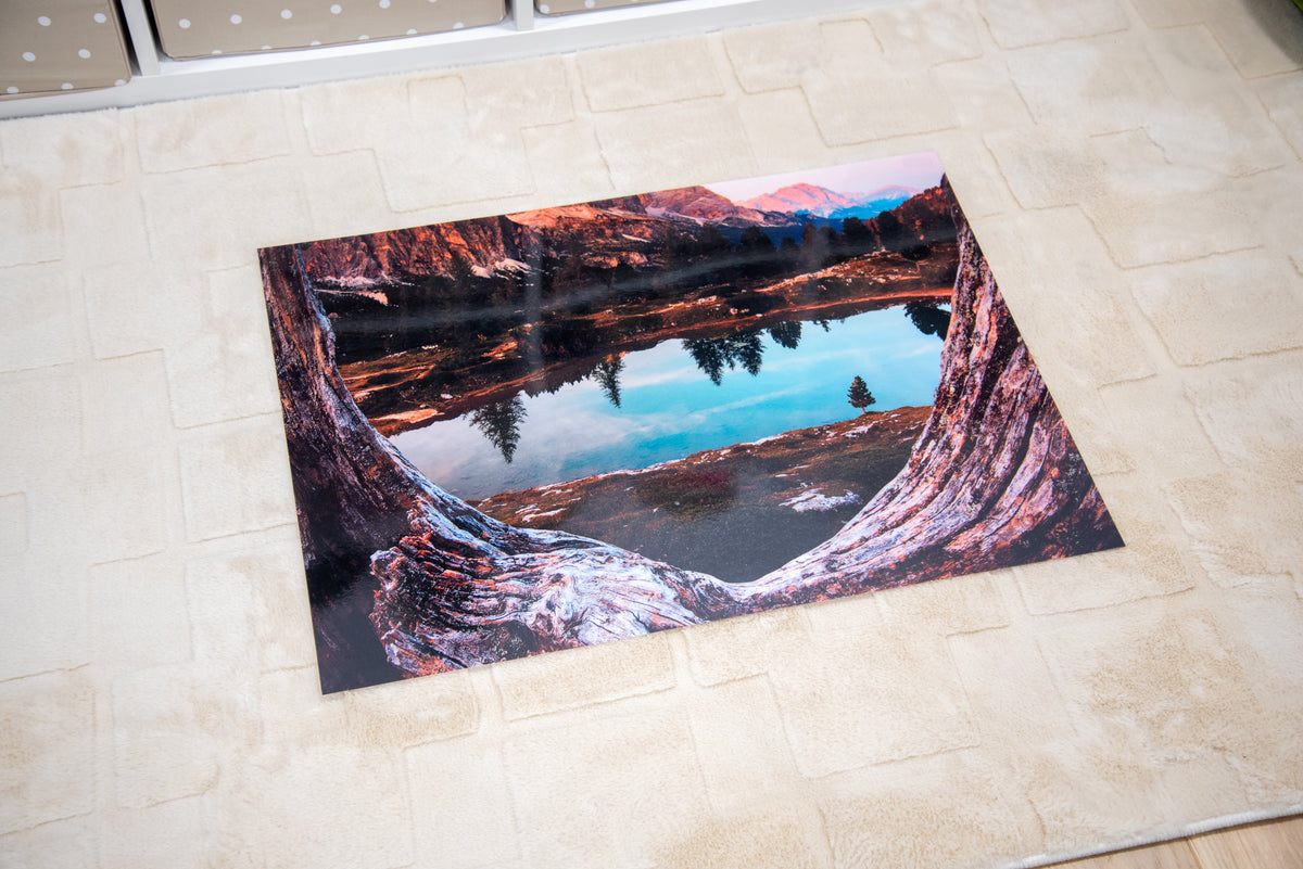 Kids’ play mat with lake view and rocky shoreline artwork