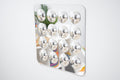 Large acrylic mirror panel featuring 16 domed round mirrors on white frame