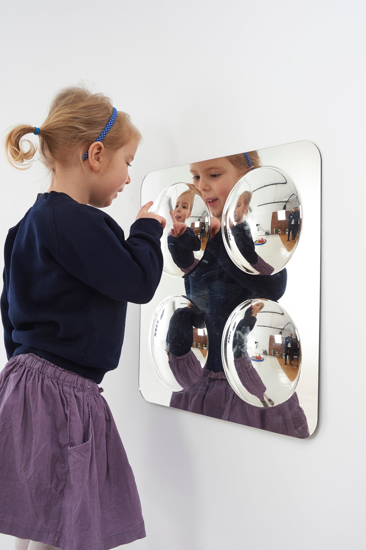Large 4-dome acrylic mirror panel with four domes, rounded edges, and bright reflections
