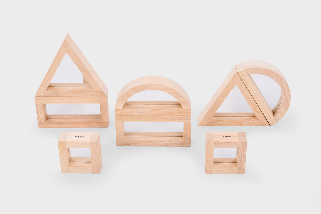 Wooden mirror blocks pieces with arched and triangular frames, unassembled view