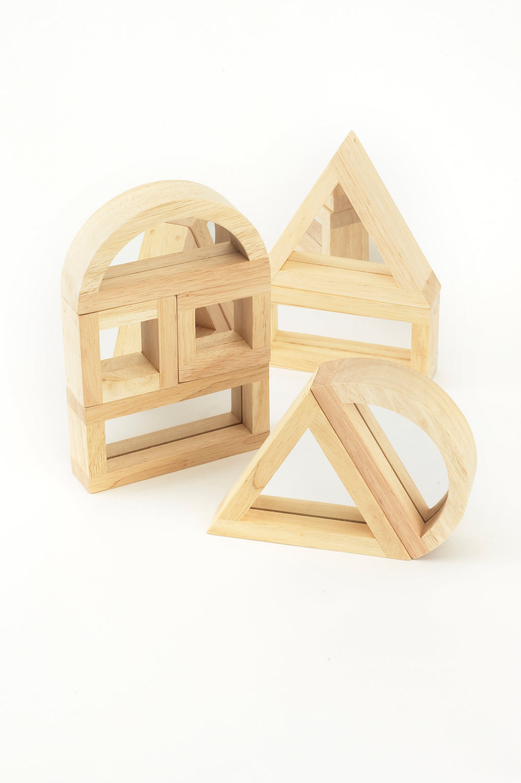 Wooden mirror blocks with arched frames and a triangular piece, laid out
