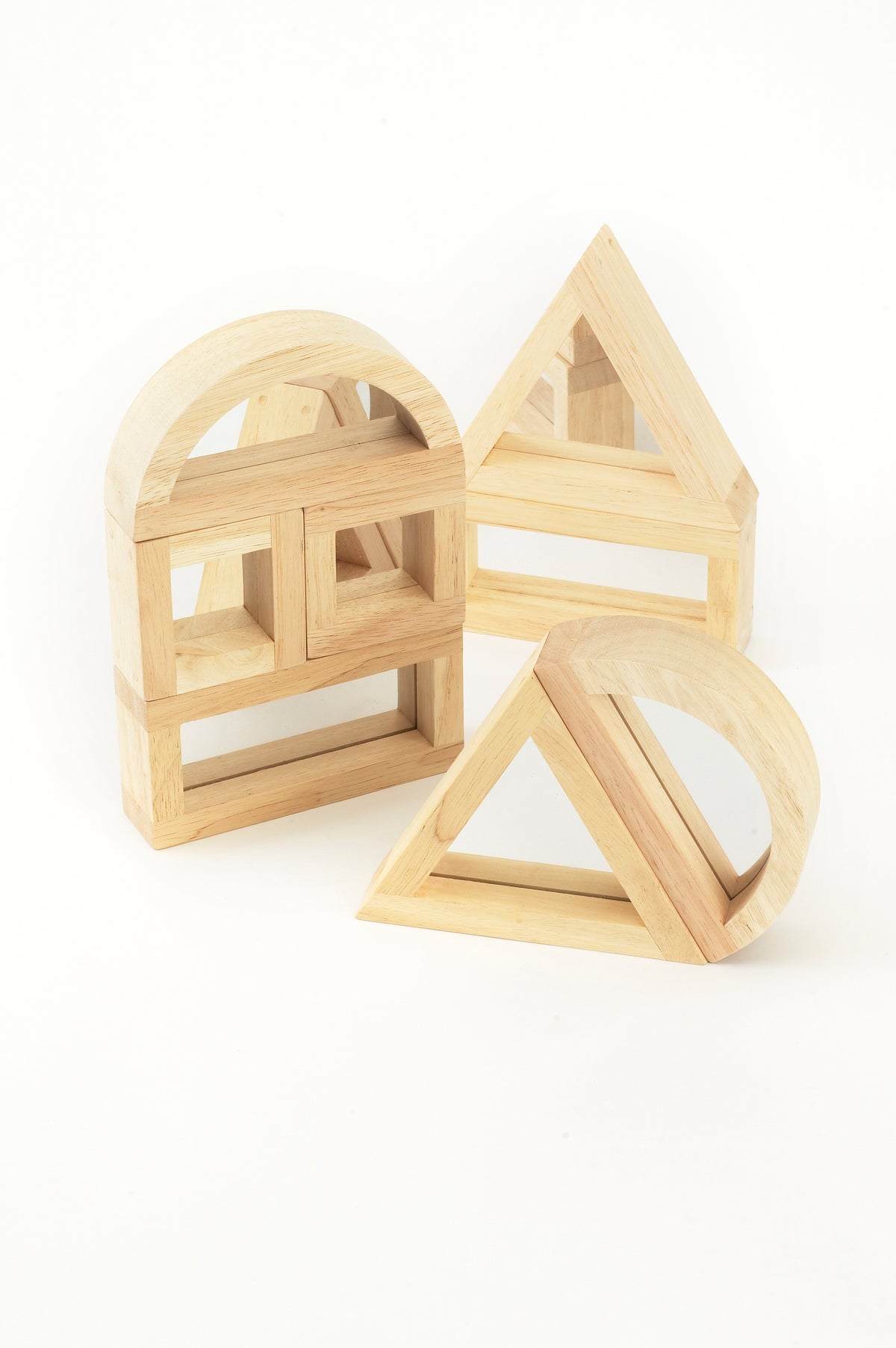 Wooden mirror blocks with arched frames and a triangular piece, laid out