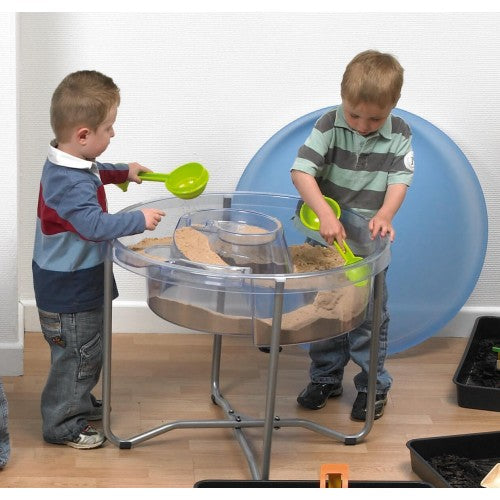 Large round clear activity tray on silver metal stand, open top