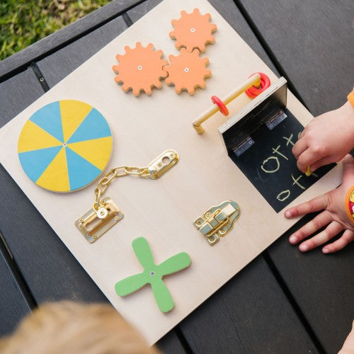 Sensory learning board with wooden gears, tic-tac-toe grid, and shape pieces