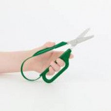 Loop-handled scissors with green finger loops and metal blades in hand