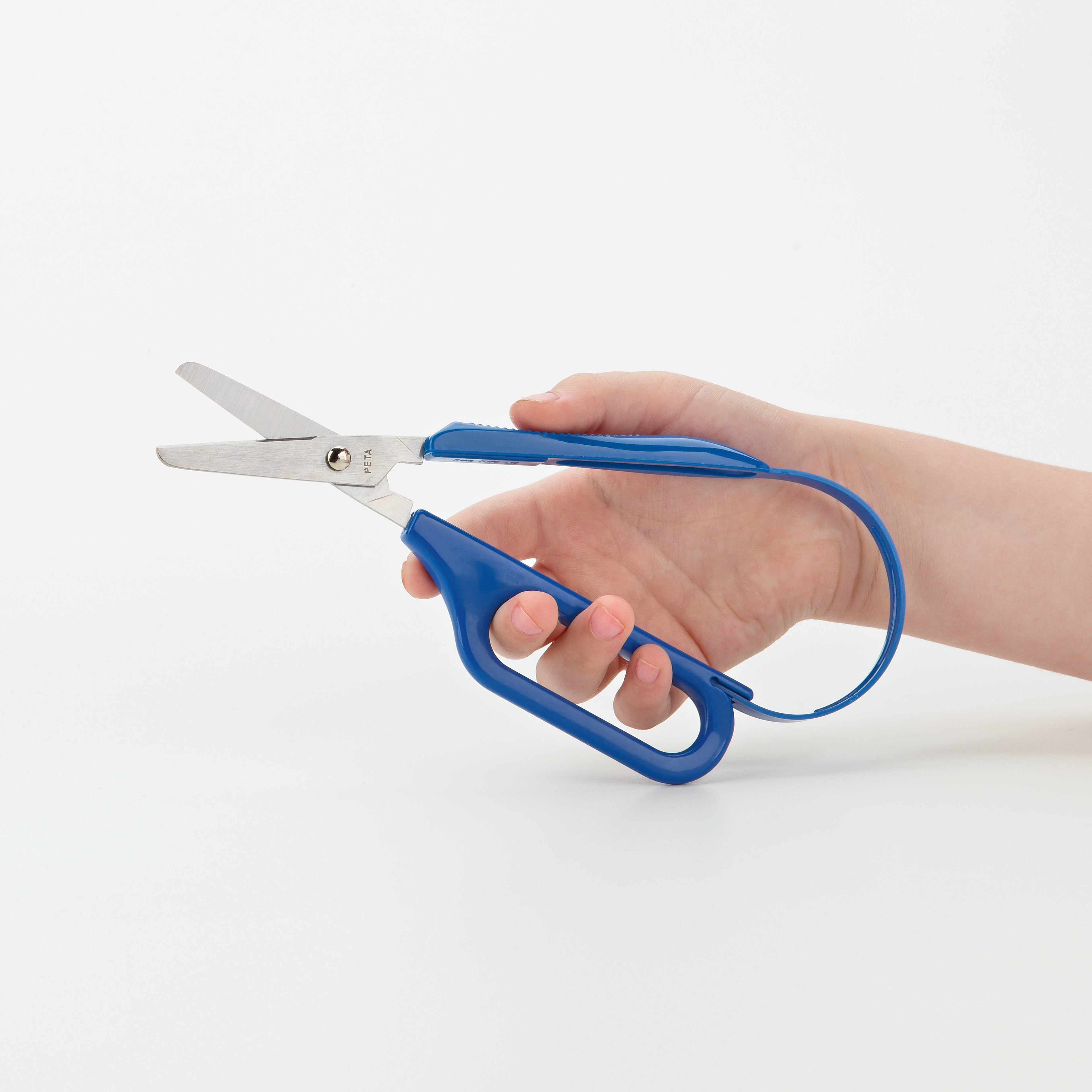 Loop-handled scissors with blue finger loops and metal blades in hand