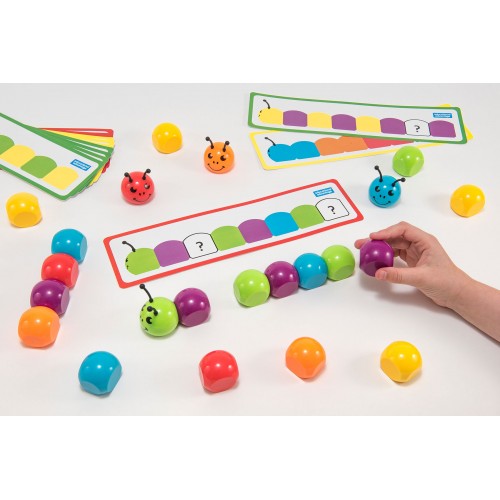 Magnetic color sequencing bug board with multicolor ladybug pieces and tracks