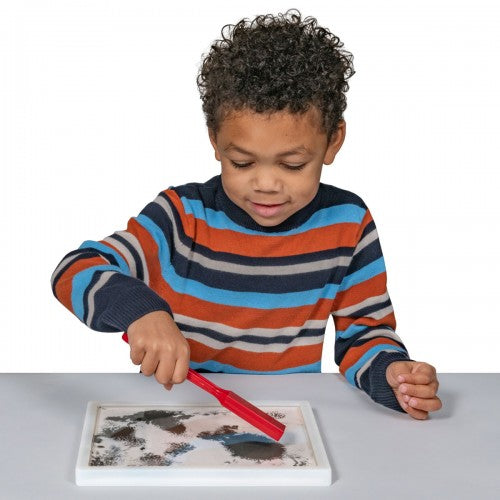 Magnetic field wonder window with red wand and silver speckled drawing panel