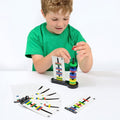 Magnetic match rings set with colored rings and bar pieces on a base stand