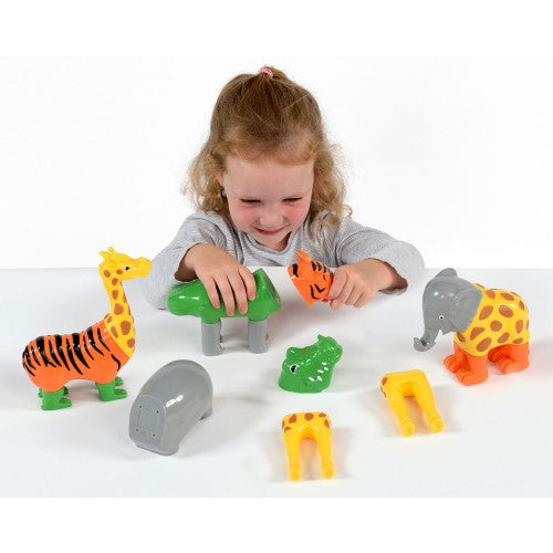 Set of magnetic wild animal figures in orange, green, yellow, and gray