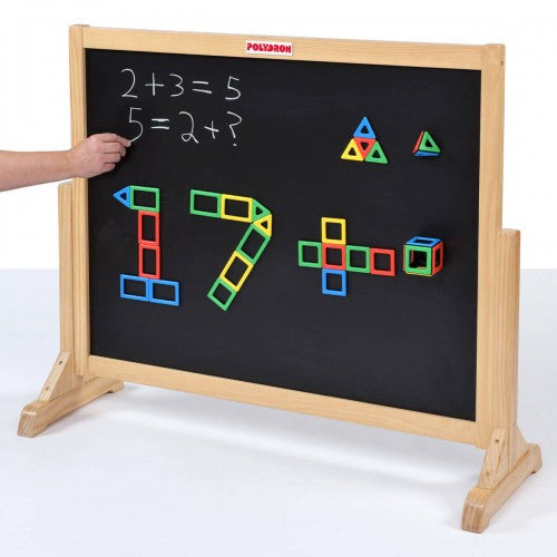 Wooden magnetic activity board with black writing surface, math scribbles and colorful shape pieces