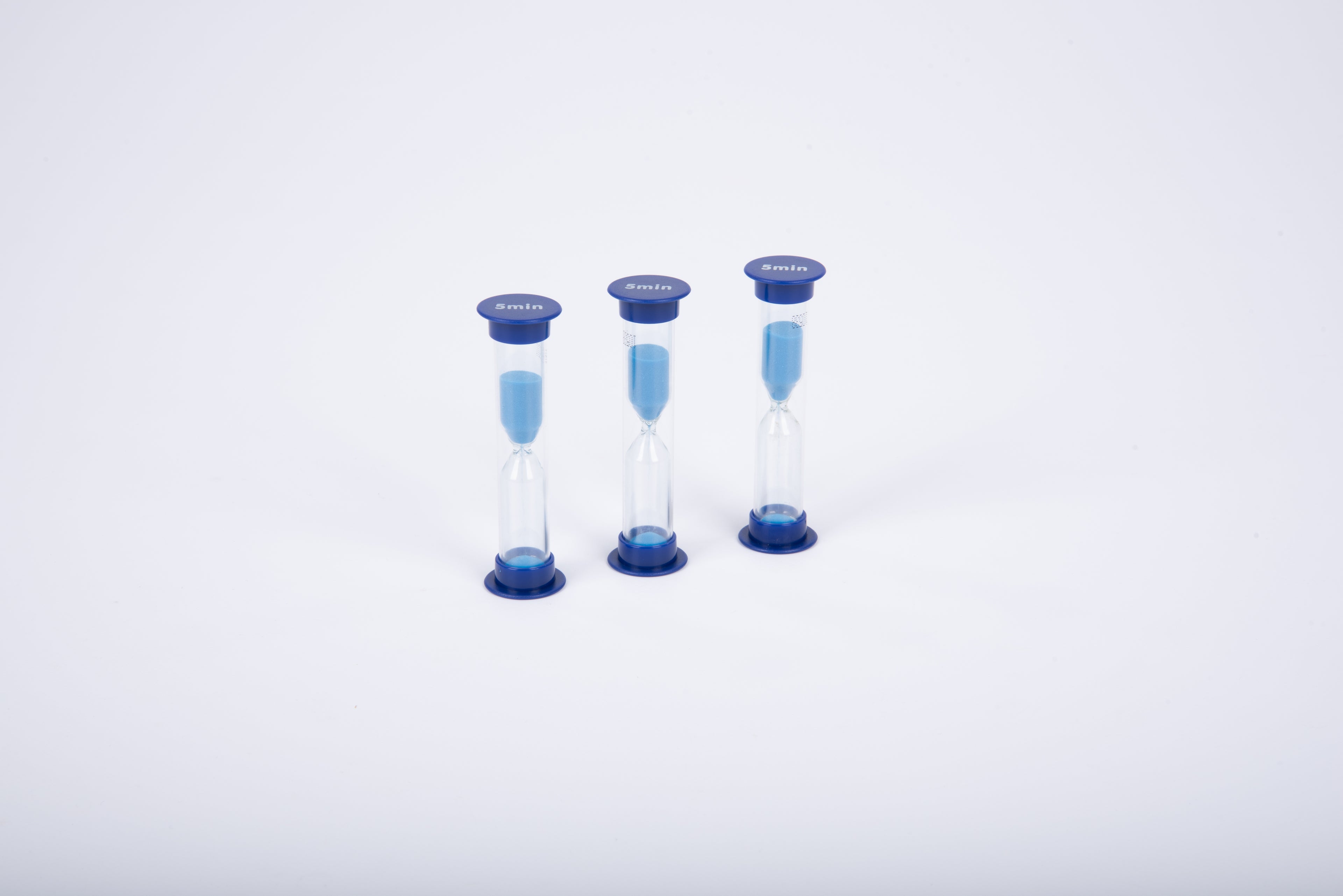 Mini sand timers, three blue-capped glass hourglasses with visible blue, yellow, and green sand