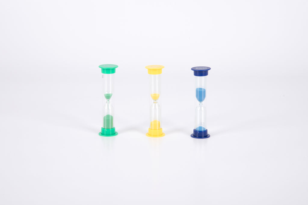 Three mini sand timers side by side: green, yellow, and blue hourglasses