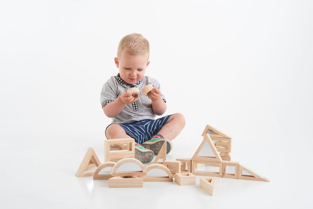 Wooden building blocks set with arched and house-shaped pieces