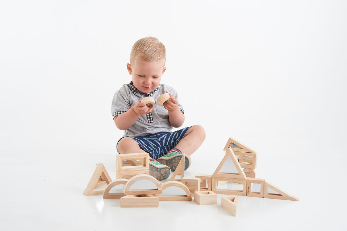 Wooden building blocks set with arched and house-shaped pieces