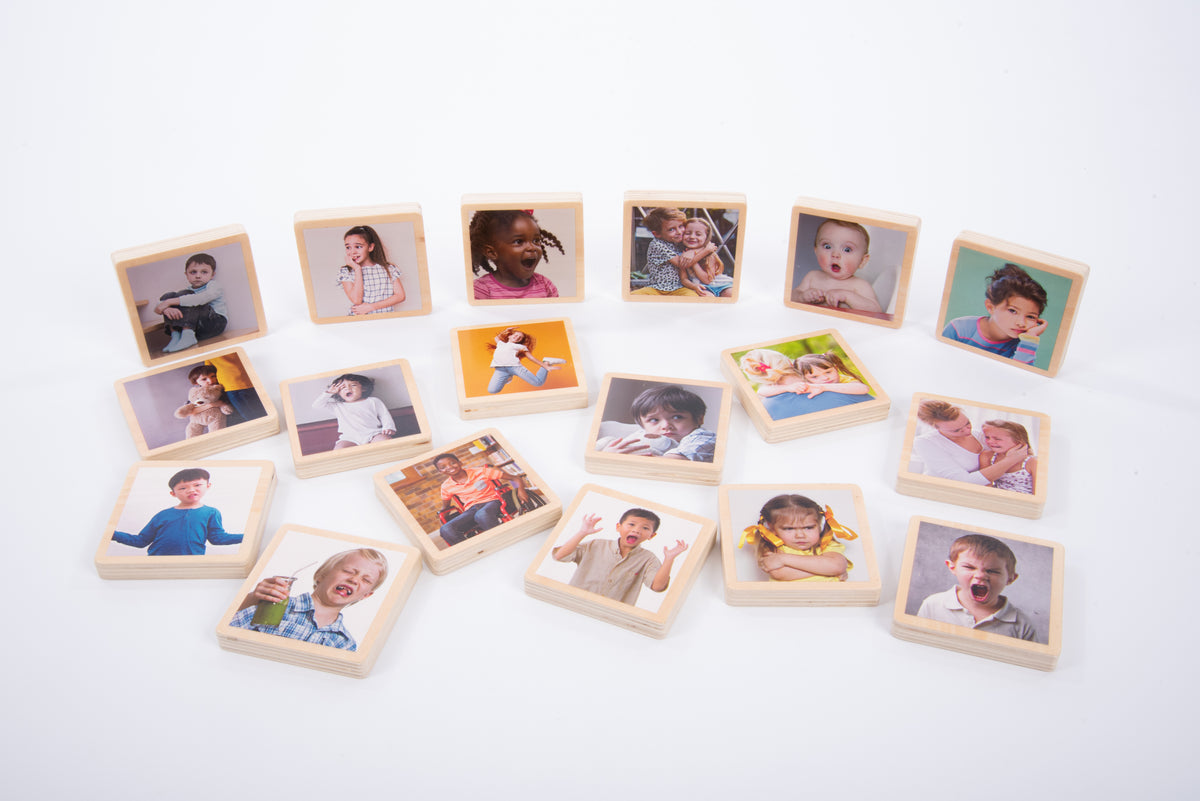 Wooden photo tiles with assorted children portrait photos, shown in a grouped layout