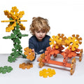 Octoplay class set with green, yellow, and orange interlocking blocks and bench base