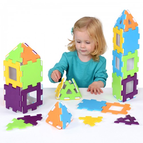 Colorful interlocking plastic building pieces set, forming two tower shapes and flat panels