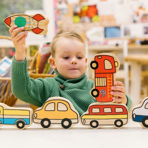 Children's vehicle play set with colorful wooden-style car and bus shapes