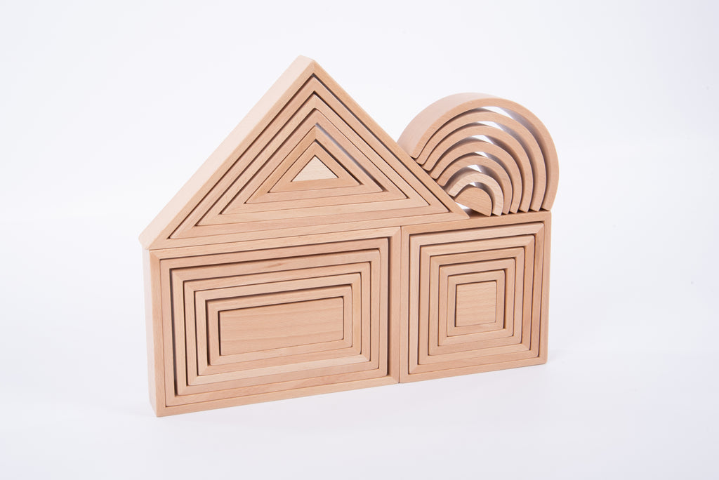 Wooden block house with stacked roof panels and rainbow arch pieces