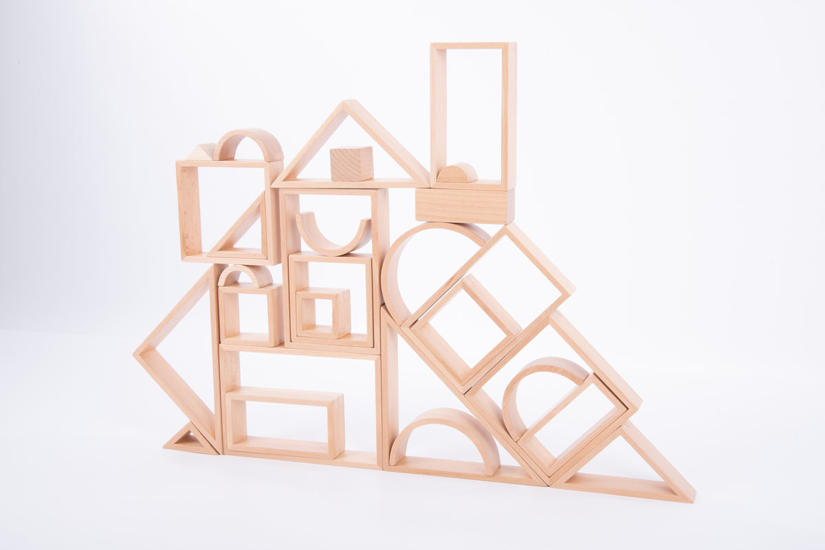 Wooden architectural block set with doorway frames, arches, and ramp blocks
