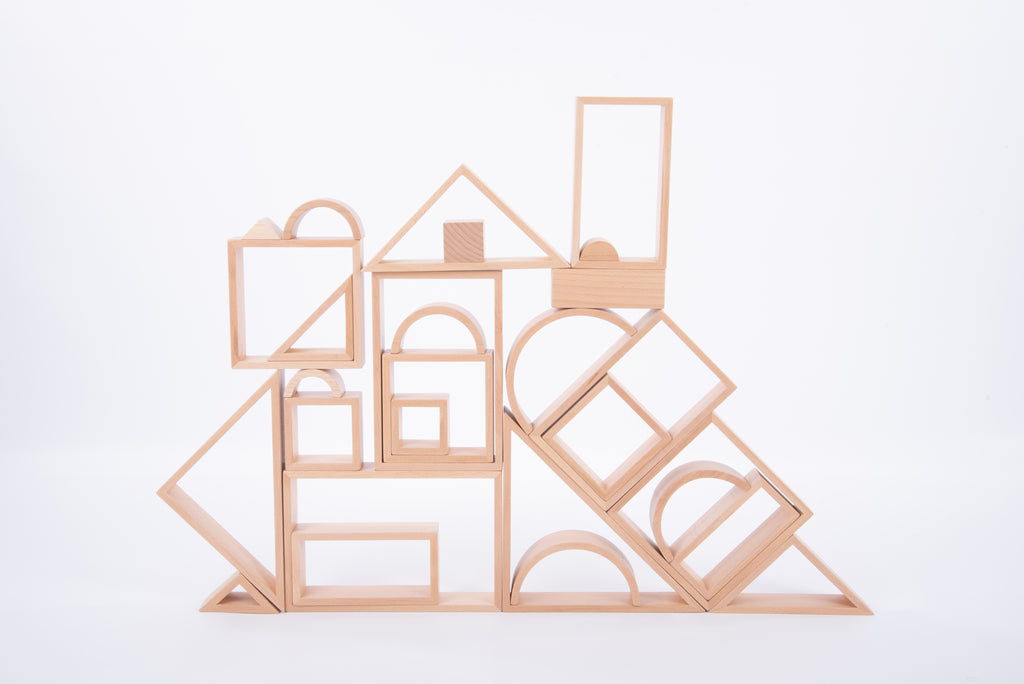 Wooden architectural block set with windows, doors, arches, and slanted base pieces