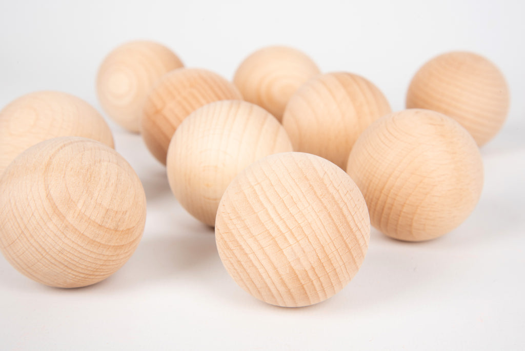 Natural wooden balls, 50mm, light wood spheres with striped grain texture.
